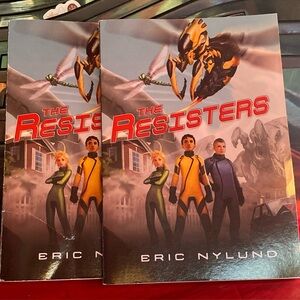 The Resisters by Eric Nylund - hc book - science fiction book Lot Of 2